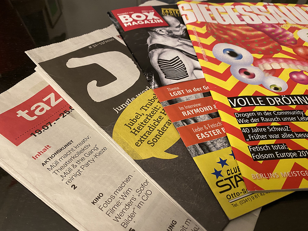Photo of magazines and newspapers featuring Ben MacLean